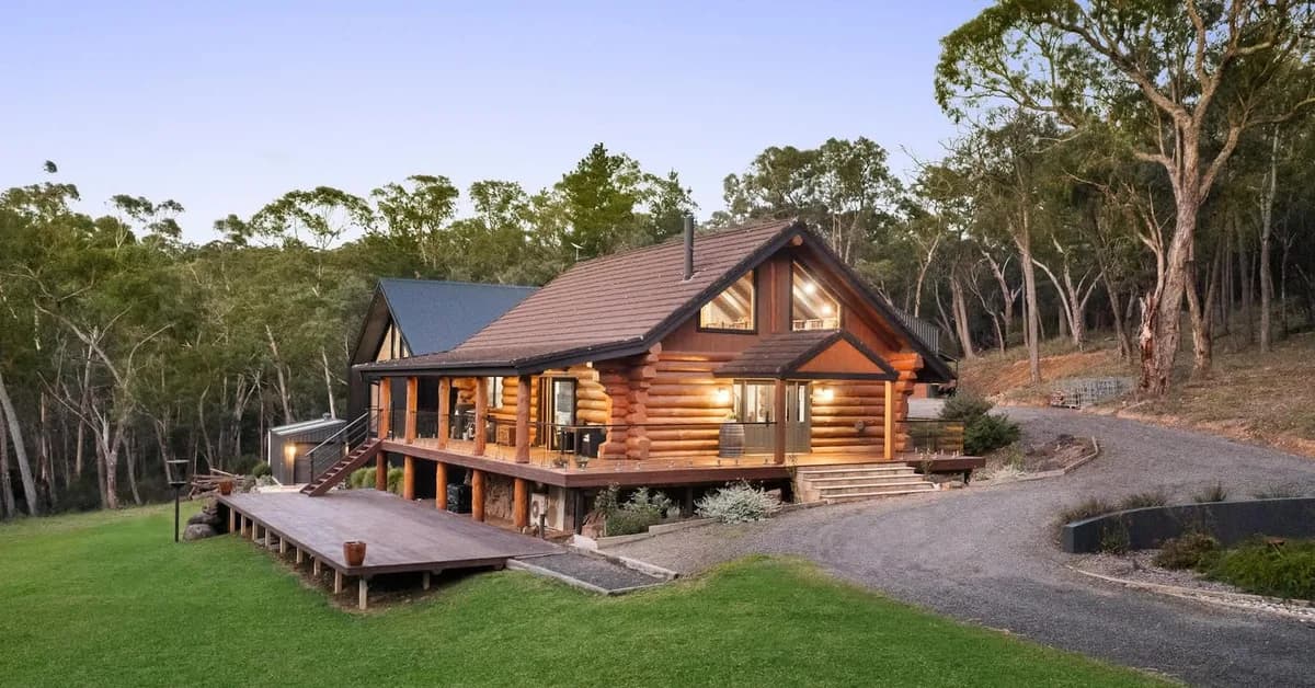 Storybook log cabin in secluded bush setting is the ultimate Christmas-in-July retreat