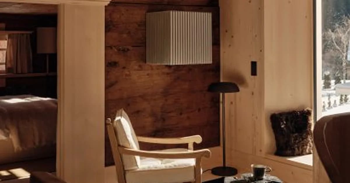 Gerold and Katia Schneider transform 17th-century Alpine lodge into wood-clad hotel