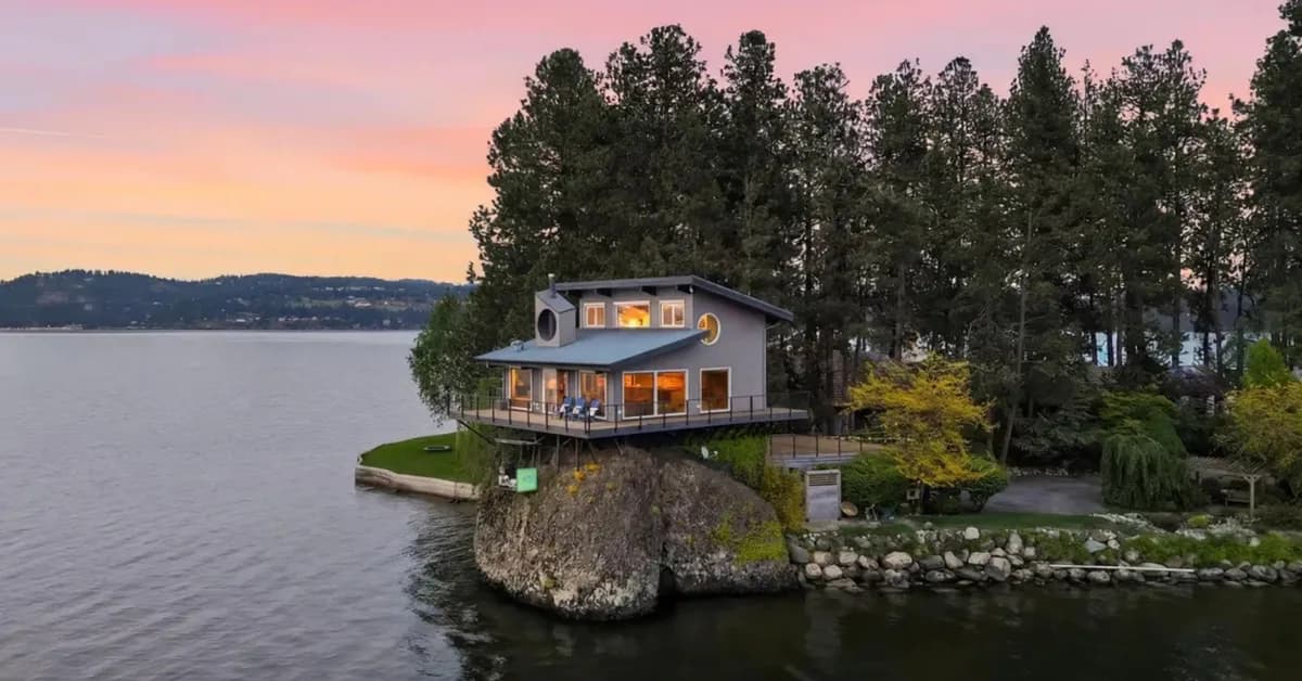 Glass-Walled House Perched on a Giant Lakeside Rock Makes It Feel Like You're 'Living in the Water'