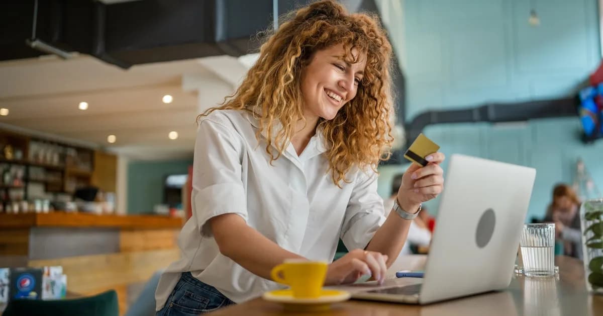 Can I refer someone to a business credit card from a personal credit card?