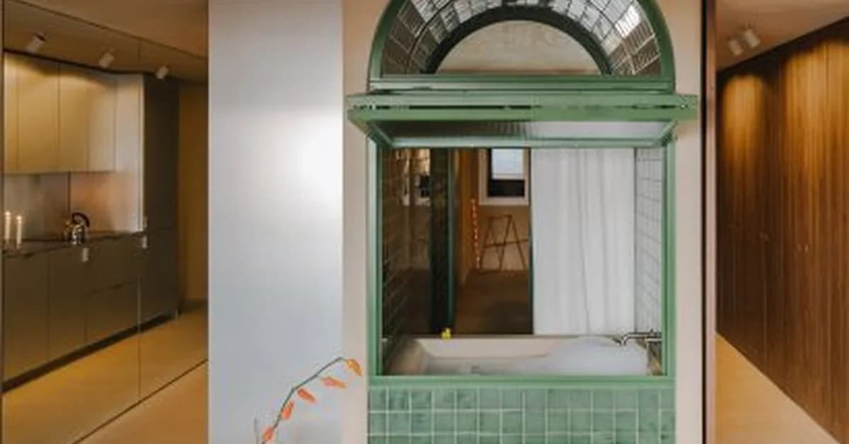 Bathtub takes centre stage in living room of Barcelona apartment