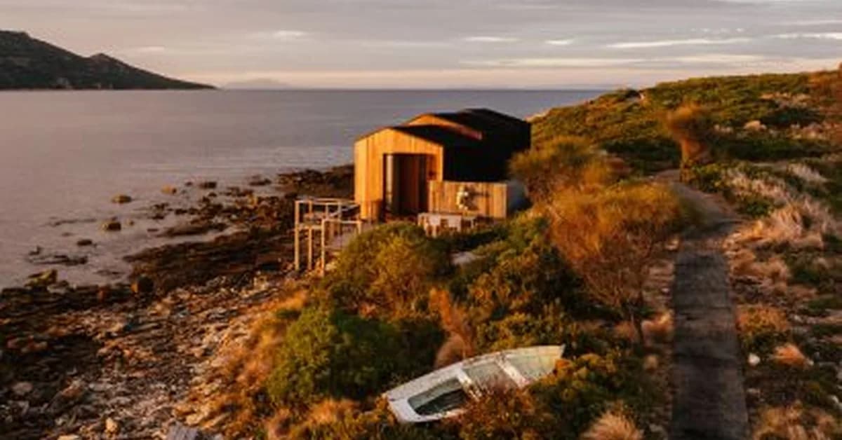 Align perches off-grid cabin on coast of tiny Tasmanian island