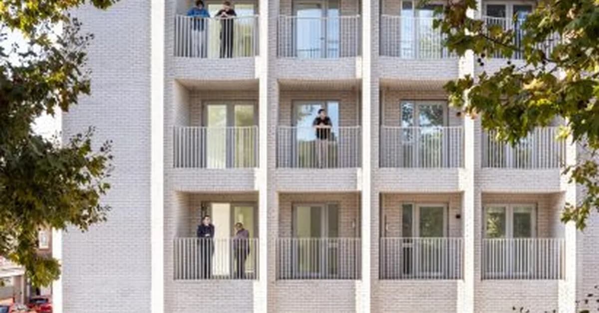 Scalloped facade ensures "strong civic presence" for London housing block