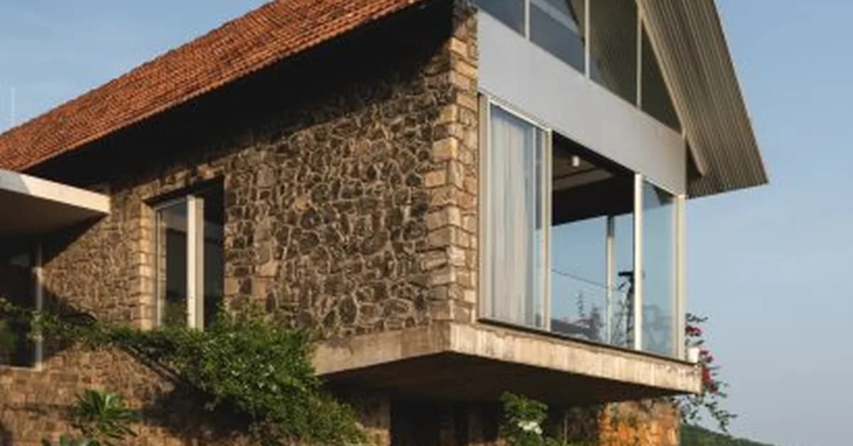 Open-air temple sits beneath granite farmhouse on Kerala hillside