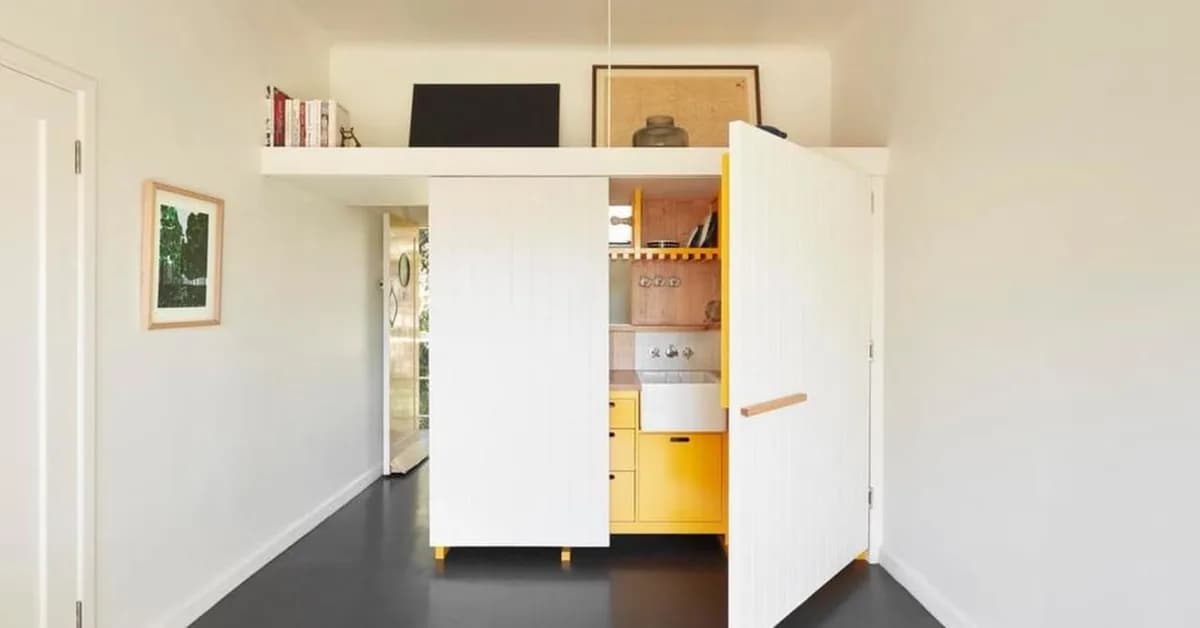 Tiny Melbourne apartment reveals secret fold-out kitchen