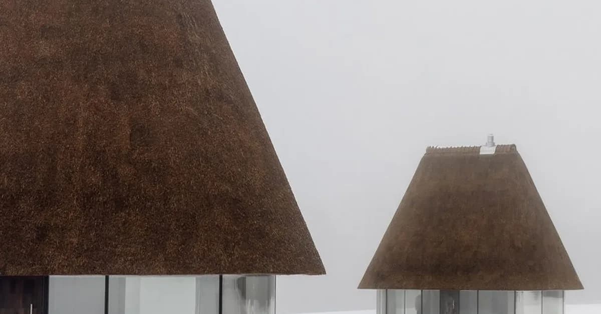 YOD Group crowns glass-sided huts with 10-metre-tall thatched roofs