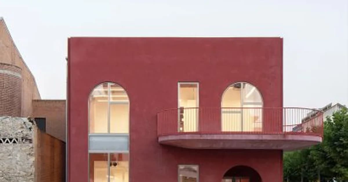 MACH designs red town hall in Spain to have "warm and welcoming presence"