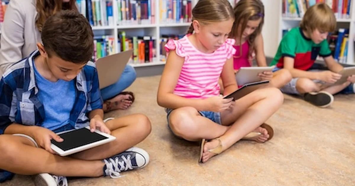 A viral case against screens in schools is winning converts. Does the evidence hold up?
