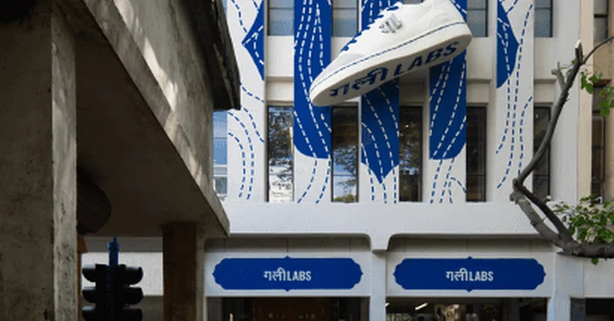 The Melange Studio suspends giant shoe from facade of New Delhi sneaker store