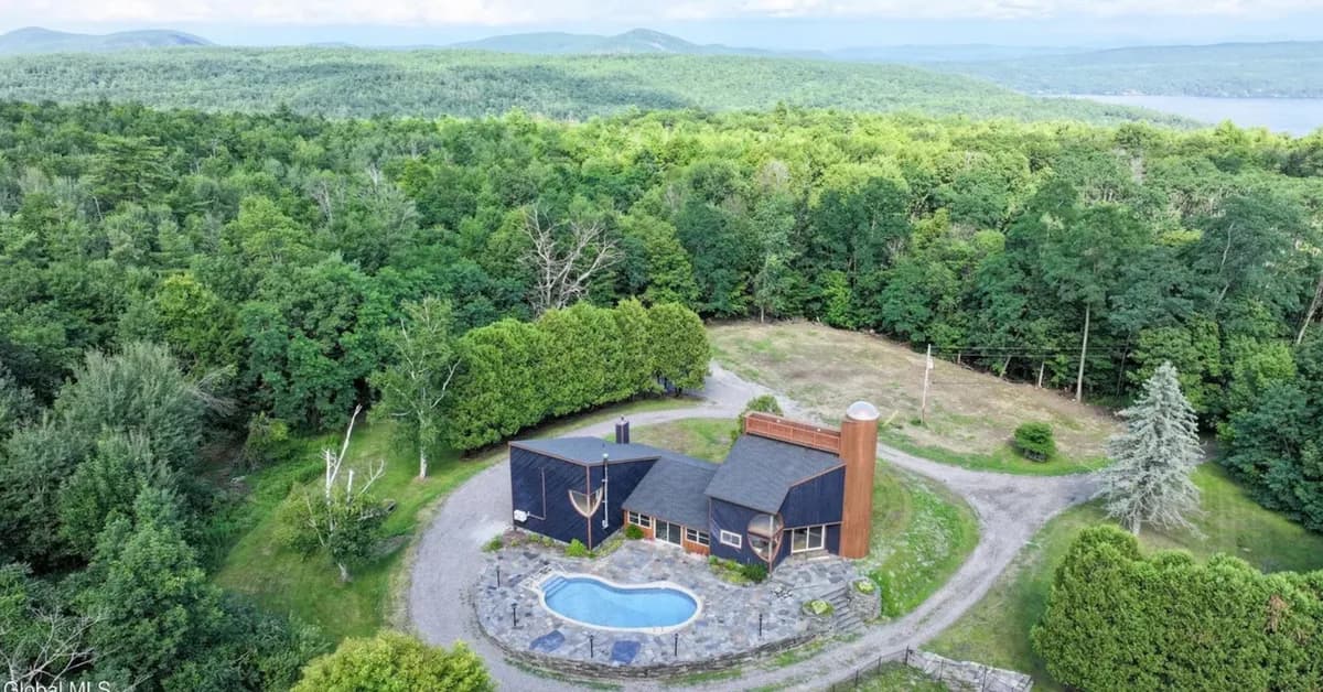 'Rare' 60-Acre Lake George Retreat with Beautifully Restored Midcentury Modern Estate Lists for Under $1 Million