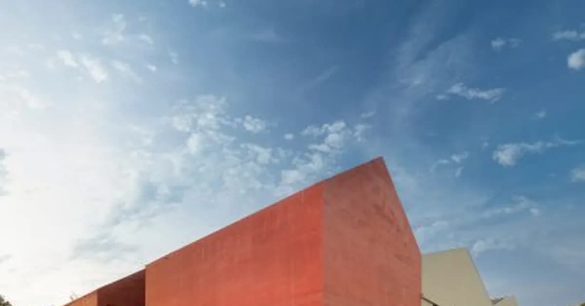 Spaceworkers transforms Portuguese granaries into museum with red-concrete extension