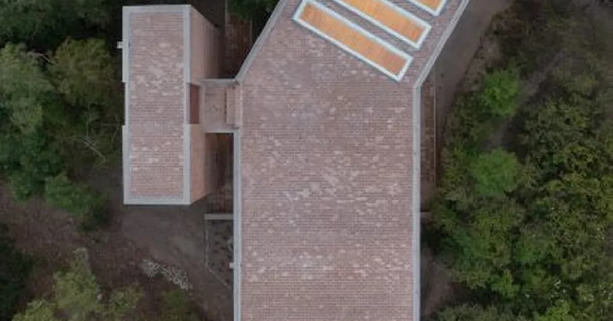 Esteras Perrote nestles brick-clad painting studio in Argentinian woodland