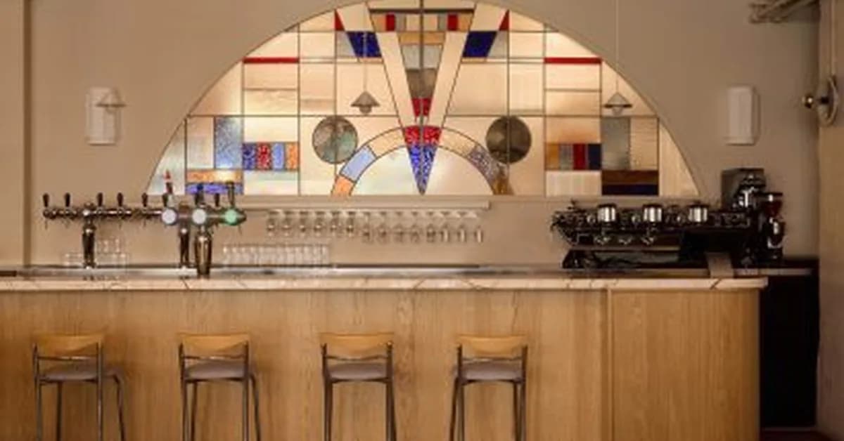 Studio Elèn Letort transforms 1920s Amsterdam cinema into "easygoing and approachable" restaurant