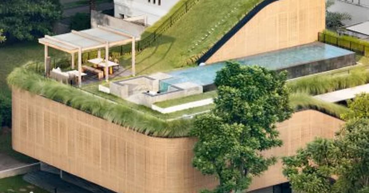 Sloping green roofs "keep the family connected" at Indonesian home