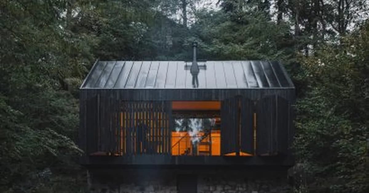 Mimosa Architects shapes Czech cabin from "rock, river and fire"
