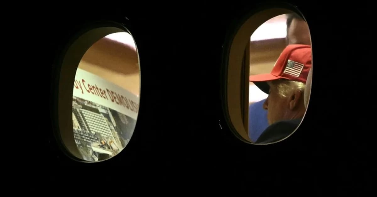 AFP photo shows Trump examining image of Kennedy Center apparent demolition
