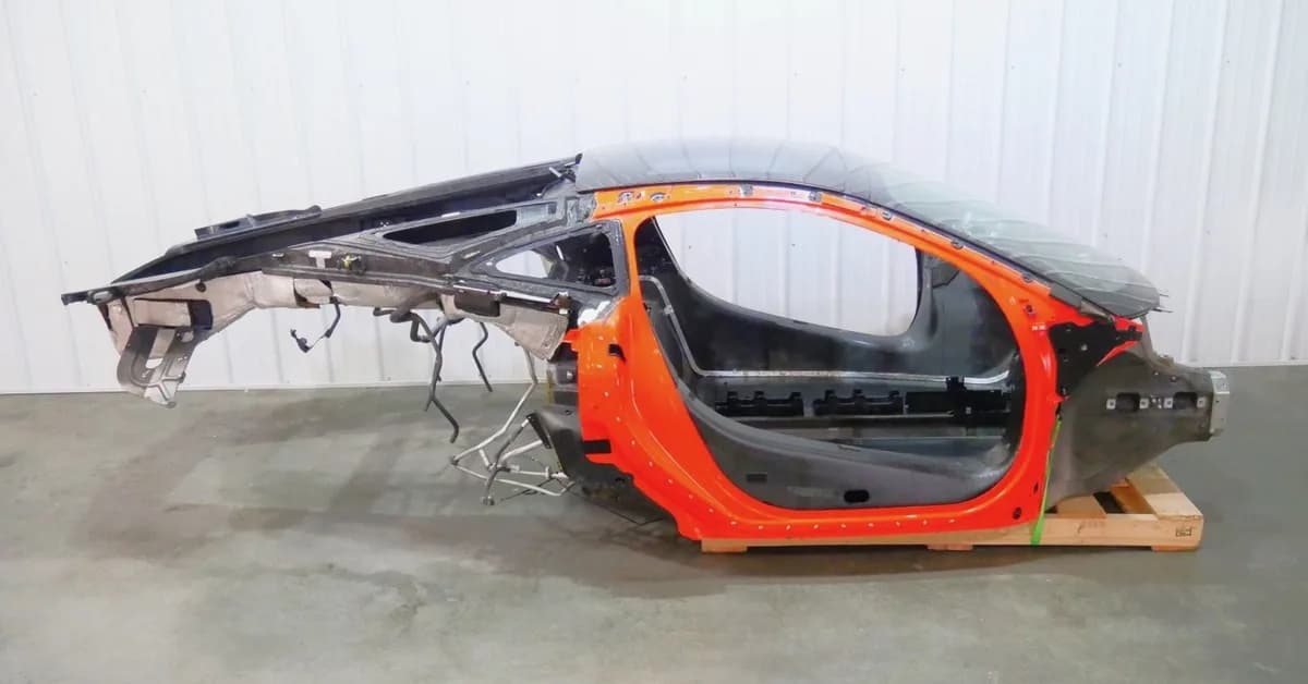 Someone Crashed a McLaren GT, So Why Not Buy the Carbon Fiber Shell and Turn It Into a Race Car Bed?